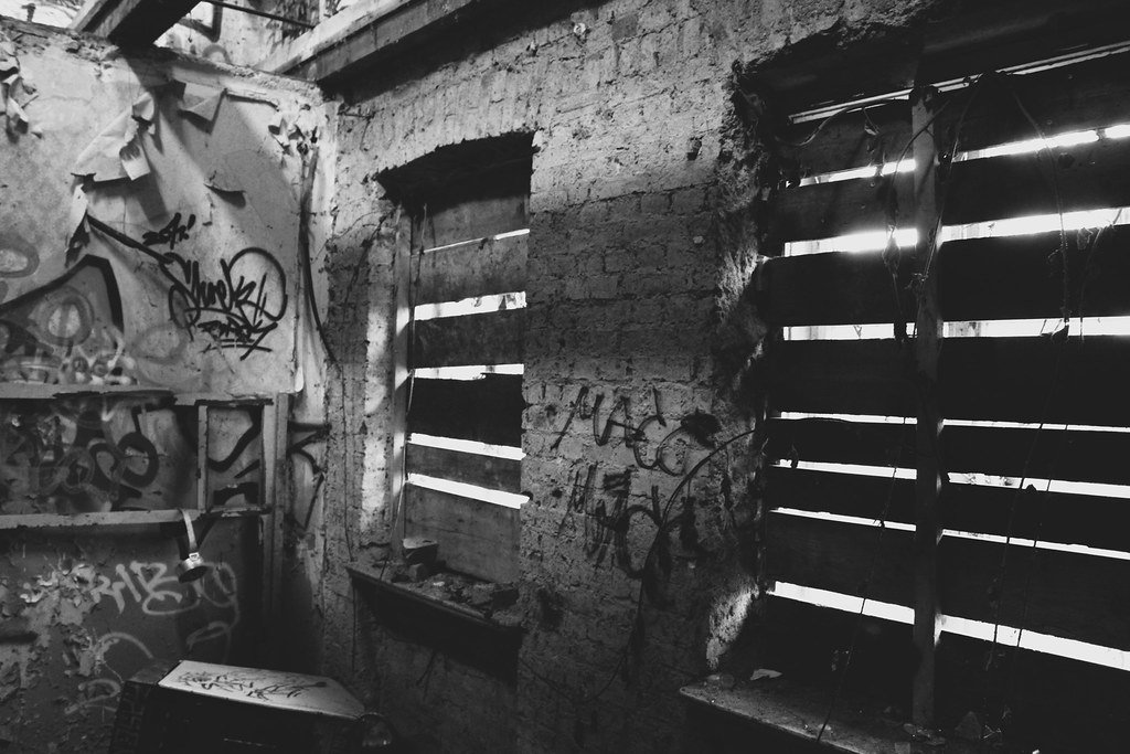 abandoned place with boarded-up windows